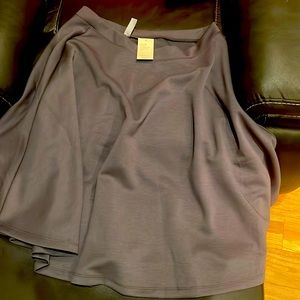 A knee length business skirt  Elastic waist